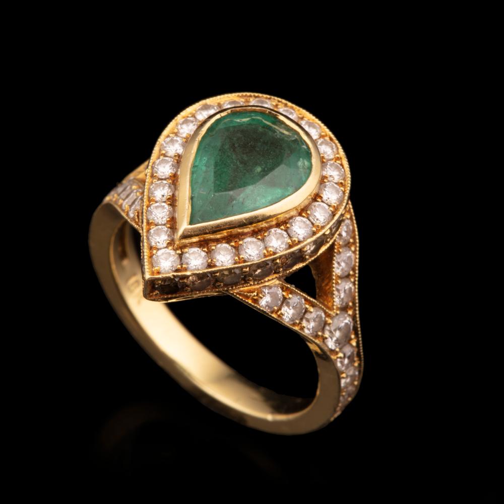 Appraisal: kt Yellow Gold Emerald and Diamond Ring center bezel-set pear