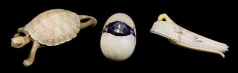 Appraisal: TWO CONTEMPORARY IVORY NETSUKE the first intricately carved and tinted