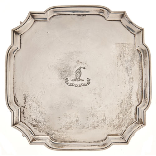 Appraisal: An Edward VIII shaped square silver waiter on claw and