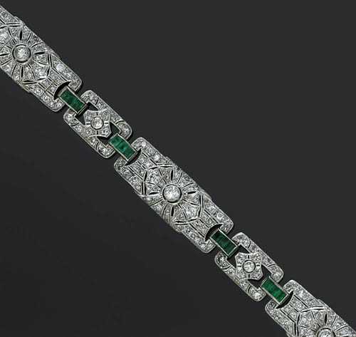 Appraisal: DIAMOND AND EMERALD BRACELET ca Platinum Elegant bracelet the open-worked