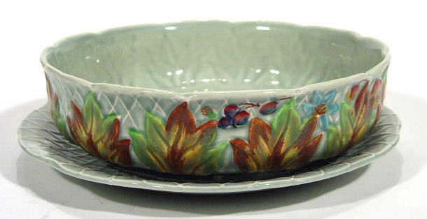 Appraisal: Clarice Cliff strainer on stand hand painted with leaves and