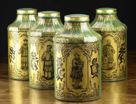 Appraisal: A set of four large green ground tea canisters the