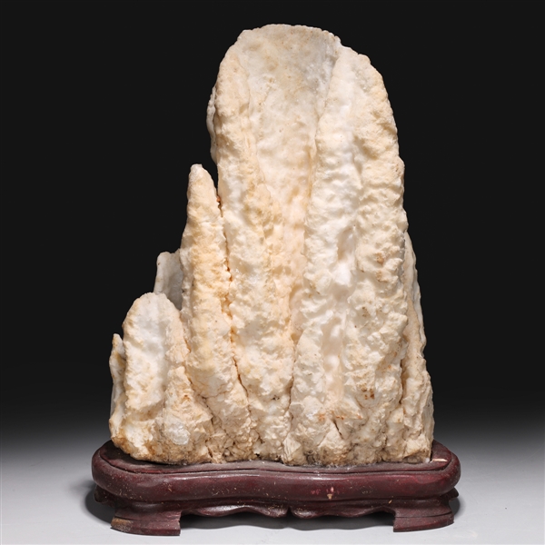 Appraisal: Large natural calcite mineral specimen with coral-like folds from a