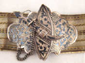 Appraisal: A Russian silver niello belt buckle and plaques mounted on