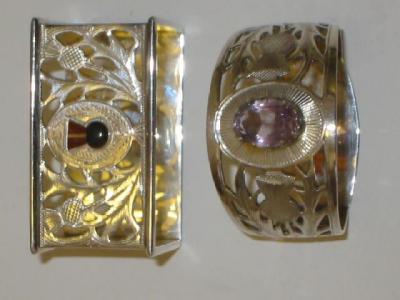 Appraisal: A NAPKIN RING maker J C S Birmingham centrally set