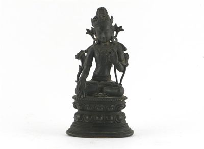 Appraisal: A Tibetan bronze figure of White Tara crossed legged raised