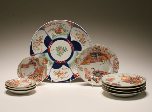 Appraisal: Japanese hand painted porcelain plates matching set of nine hand