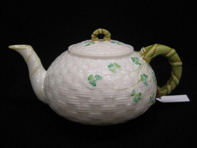 Appraisal: Irish Belleek Porcelain Teapot clover basket weave decor diameter excellent