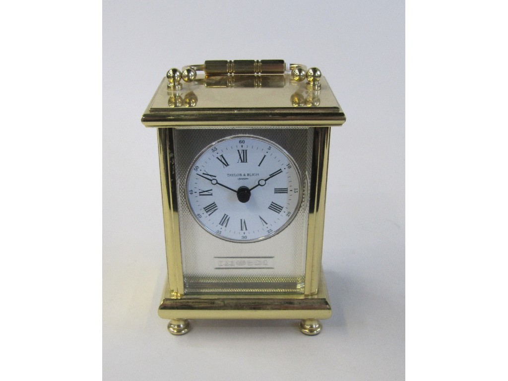 Appraisal: Silver faced brass cased carriage clock by Taylor and Bligh