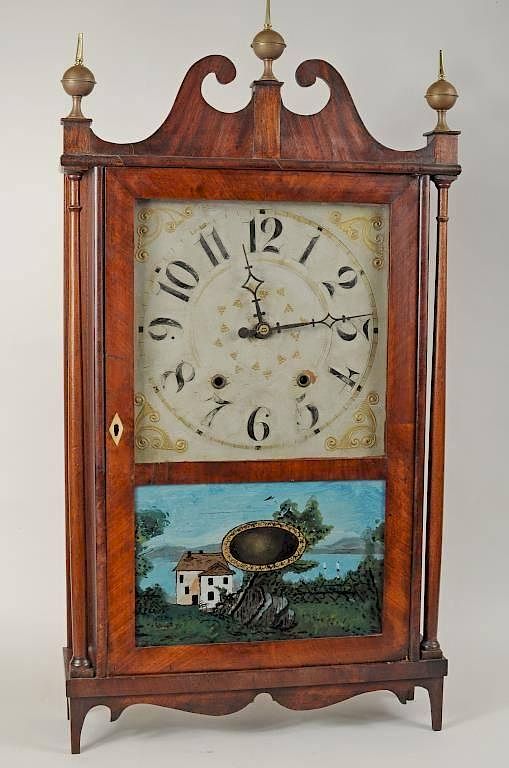 Appraisal: Mahogany Veneered Pillar Scroll Clock Mahogany veneered pillar scroll clock