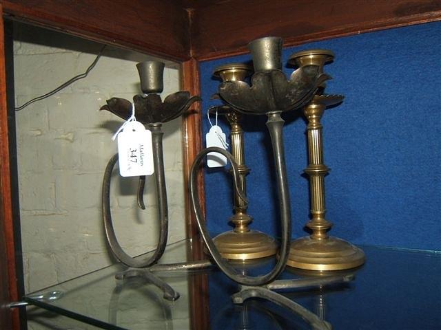 Appraisal: A pair of Victorian brass candlesticks of reeded column form