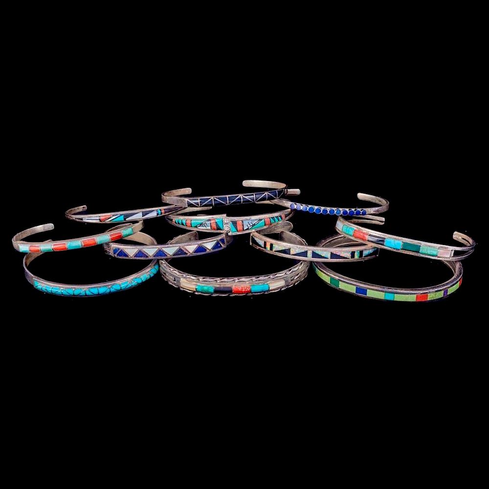 Appraisal: NAVAJO CUFF BRACELETS Eleven old pawn turquoise coral and silver