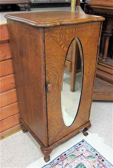 Appraisal: LATE VICTORIAN OAK MUSIC CABINET American c the single door