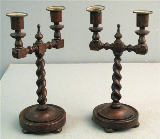 Appraisal: Pair of early twentieth century oak barley twist two branch