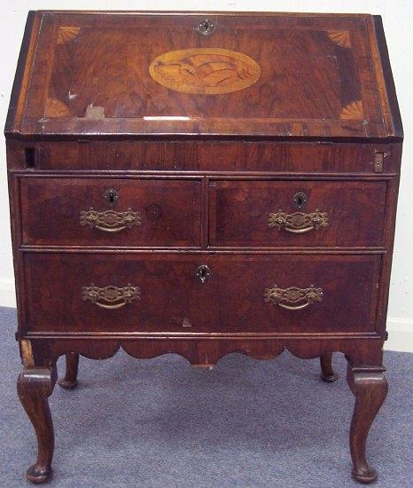 Appraisal: A Queen Anne style walnut bureau the flap inlaid a