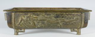 Appraisal: Bronze Jardiniere Dragon Decoration Meiji rectangular bronze jardiniere or bulb