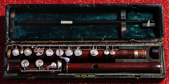 Appraisal: A RUDDALL CARTE CO PATENT FLUTE with silvered keys and