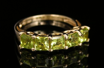 Appraisal: A Yellow Gold Band set with Peridot k yellow gold