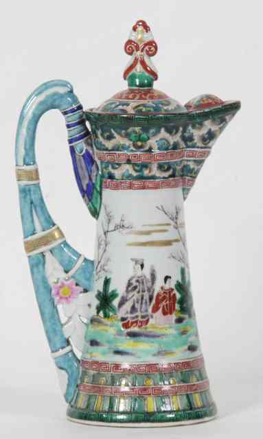 Appraisal: A Japanese ewer and cover with shaped finial to the