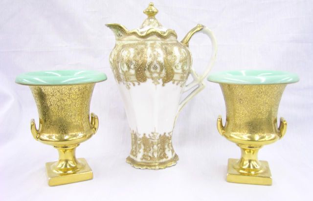 Appraisal: Pair of Stouffer Trenton Pottery tall urns gold overlay on