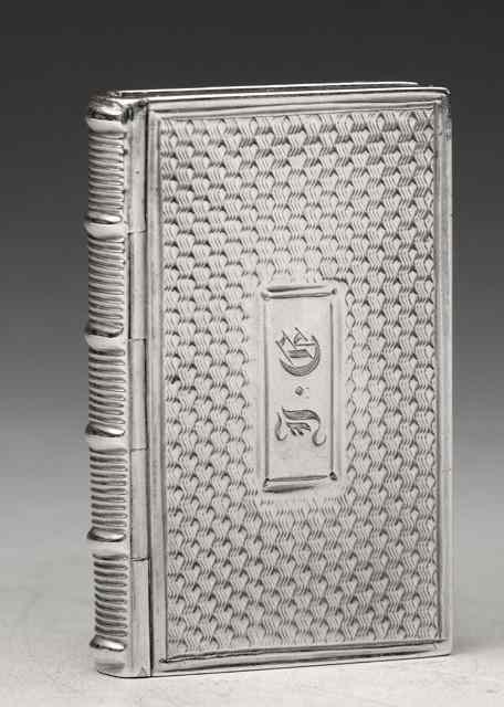 Appraisal: A WILLIAM IV SILVER VINAIGRETTE IN BOOK FORM hinged pierced