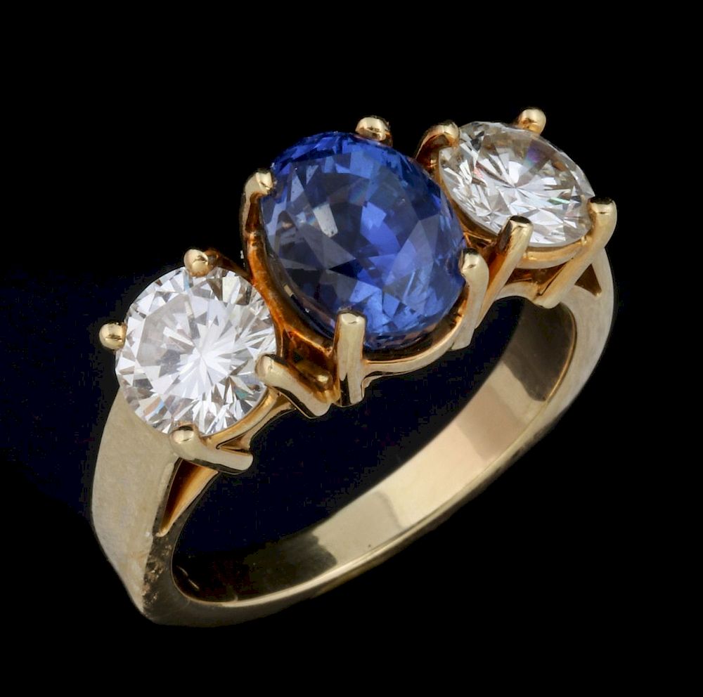 Appraisal: AN K RING WITH CT DIAMOND CT SAPPHIRE A Micky