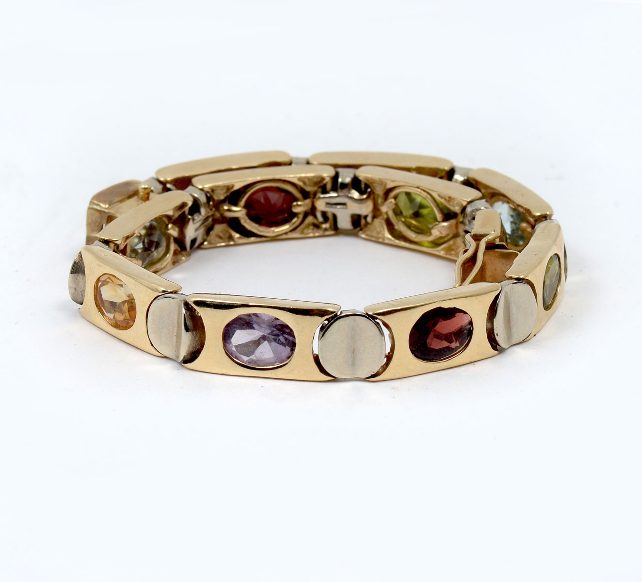 Appraisal: TONE K GEMSTONE BRACELET '' is formed with yellow gold