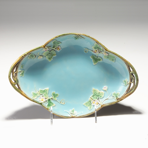 Appraisal: George Jones Majolica bread tray with strawberry blossom decoration impressed