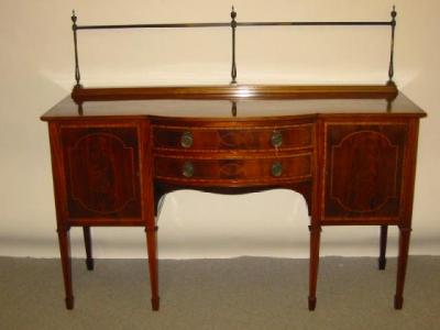 Appraisal: AN EDWARDIAN MAHOGANY SIDEBOARD of Georgian design with satinwood banding