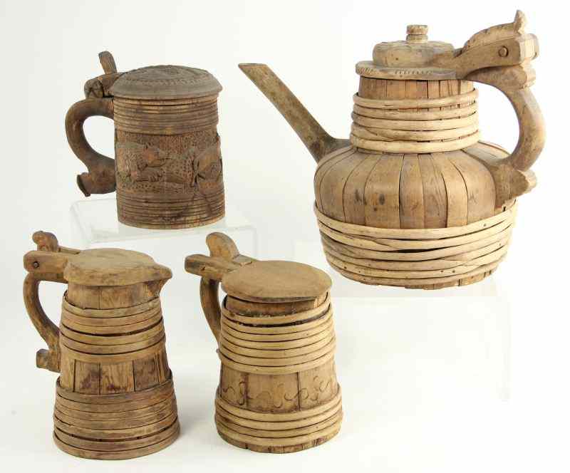 Appraisal: Three Continental Wooden Pitchers One Wooden Steinthe pitchers with barrel