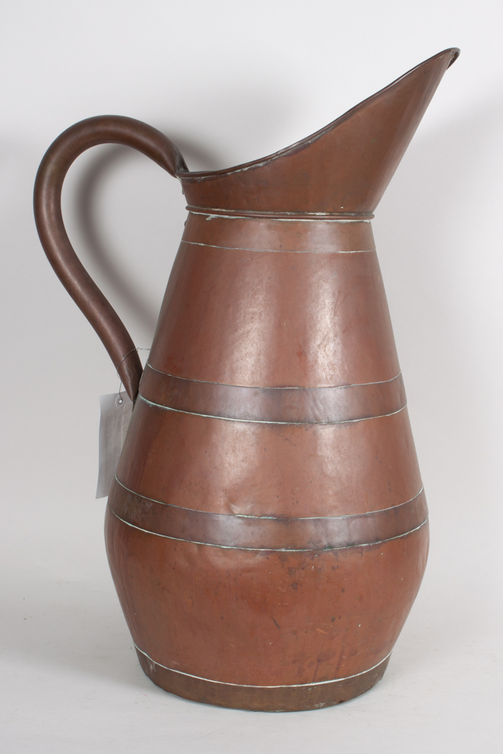 Appraisal: English large copper and copper banded jug rivet applied handle