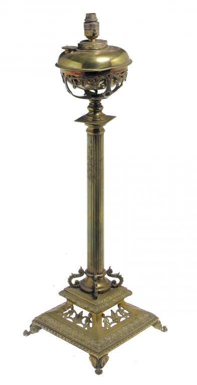 Appraisal: A VICTORIAN BRASS COLUMNAR OIL LAMP with foliate openwork fount-holder