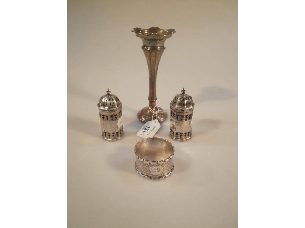 Appraisal: A pair of silver octagonal pierced condiment pots with blue