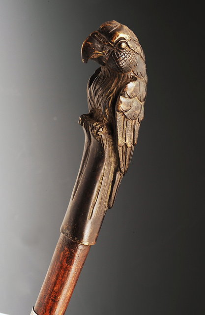 Appraisal: AN INDIAN BRONZE MODEL of a parrot mounted on a