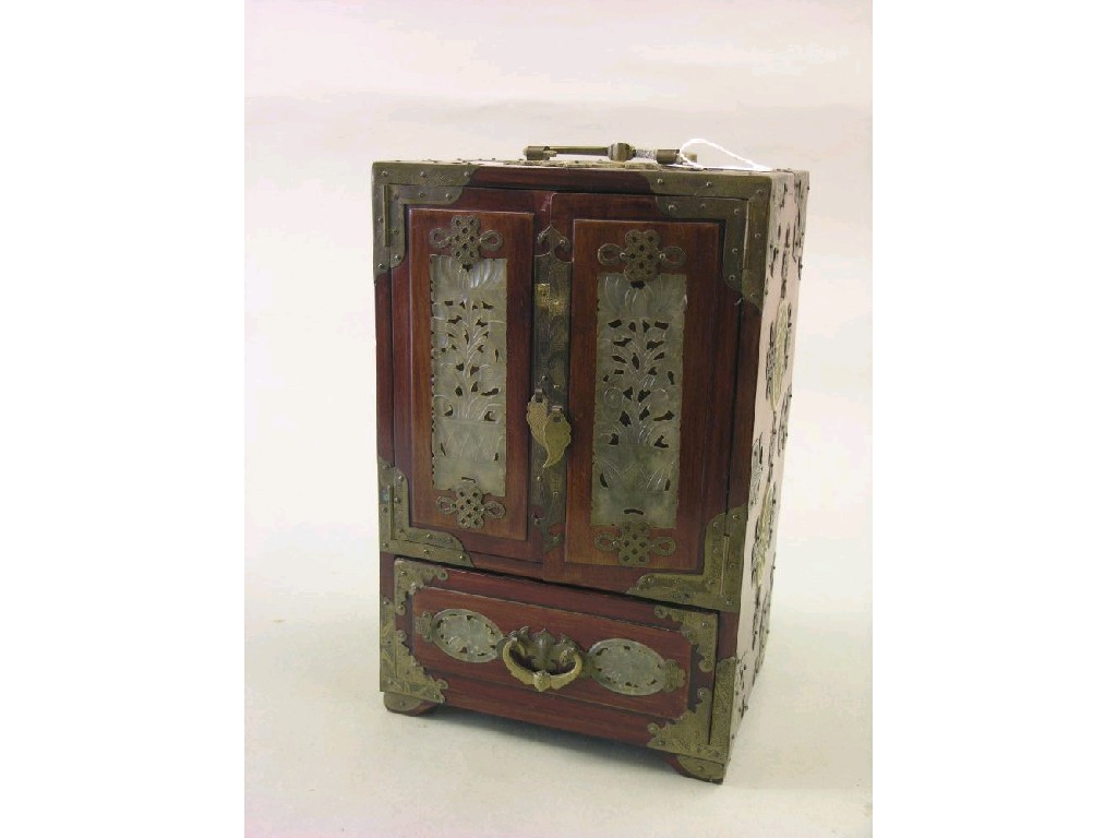 Appraisal: A Japanese hardwood table-top jewellery cabinet with elaborate engraved brass