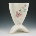 Appraisal: Hull Butterfly vase on three-footed base in white pebble finish