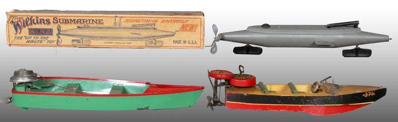 Appraisal: Lot of American Clockwork Toy Boats with Ori Description All