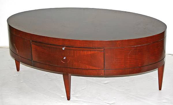 Appraisal: A Neoclassical style mahogany coffee table Baker