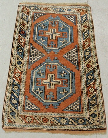 Appraisal: - Colorful Caucasian oriental mat with two geometric medallions x