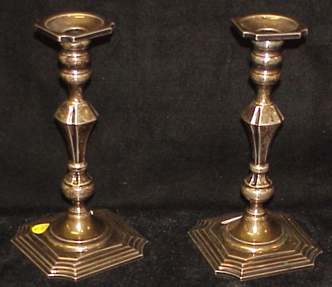 Appraisal: Pair of sterling candlesticks square foot with incut corners h