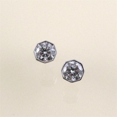 Appraisal: A pair of diamond stud earrings the circular cut diamonds