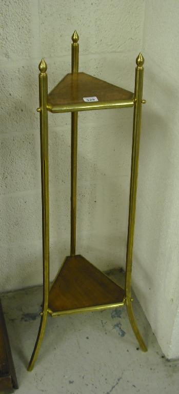 Appraisal: Brass and rosewood two tier triangular upright stand with pointed