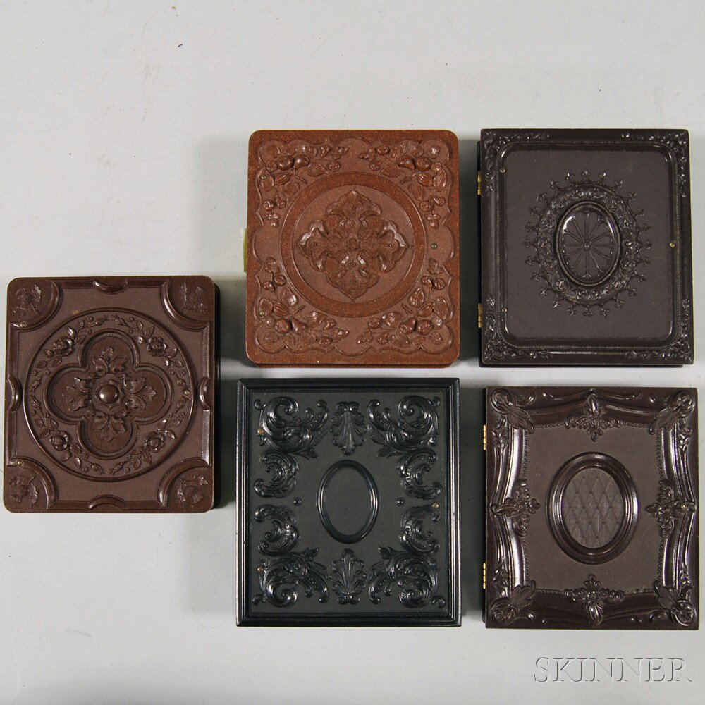 Appraisal: Five Sixth-plate Size Thermoplastic Union Cases four brown two Geometric