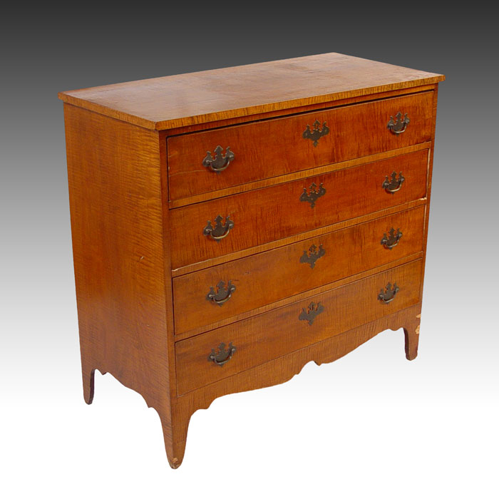 Appraisal: EARLY TIGER MAPLE VENEER DRAWER CHEST Shaped skirt under drawers