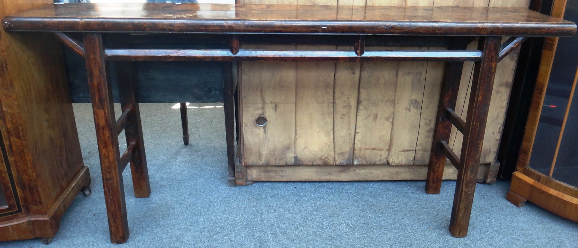 Appraisal: An early th century Chinese hardwood altar table on block