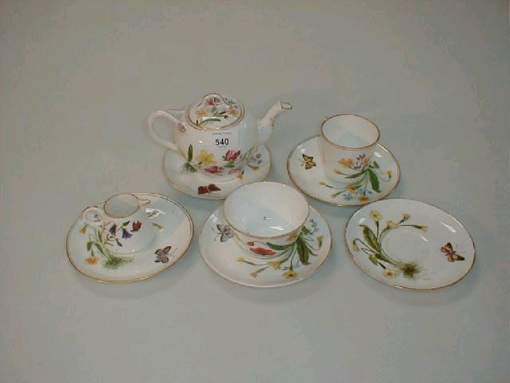 Appraisal: A Coalport porcelain tea for two service painted by Laura