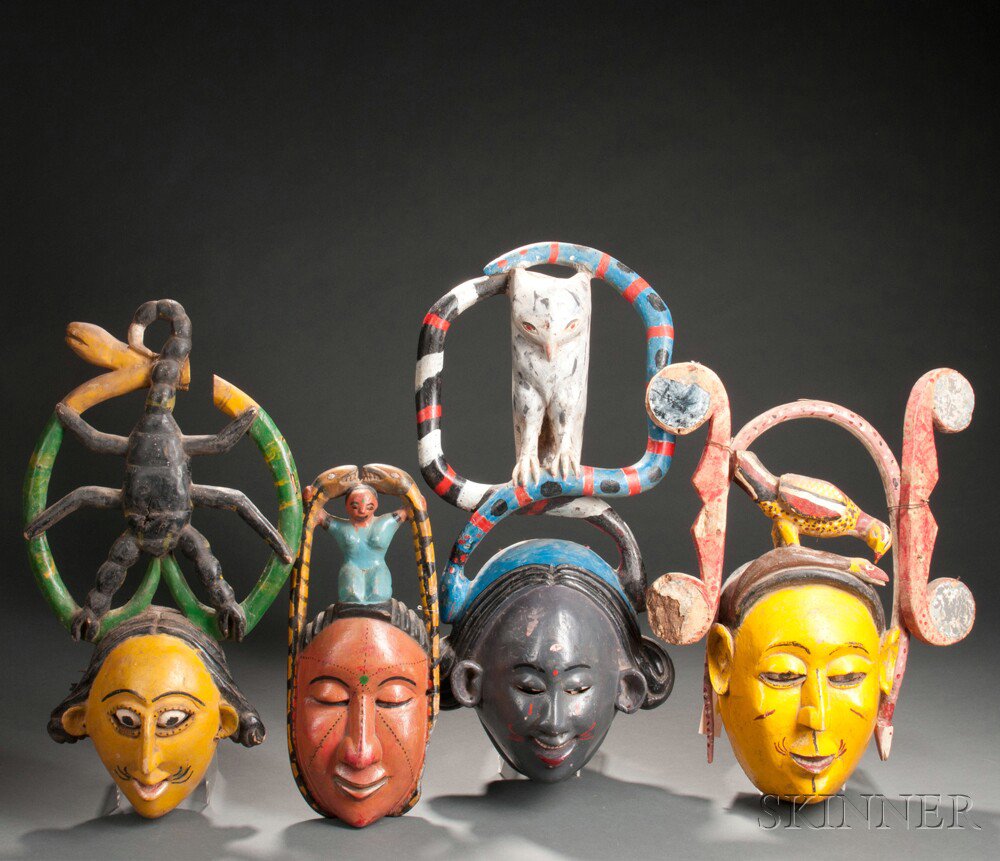 Appraisal: Four Ibibio Polychrome Carved Wood Face Masks Nigeria the superstructures