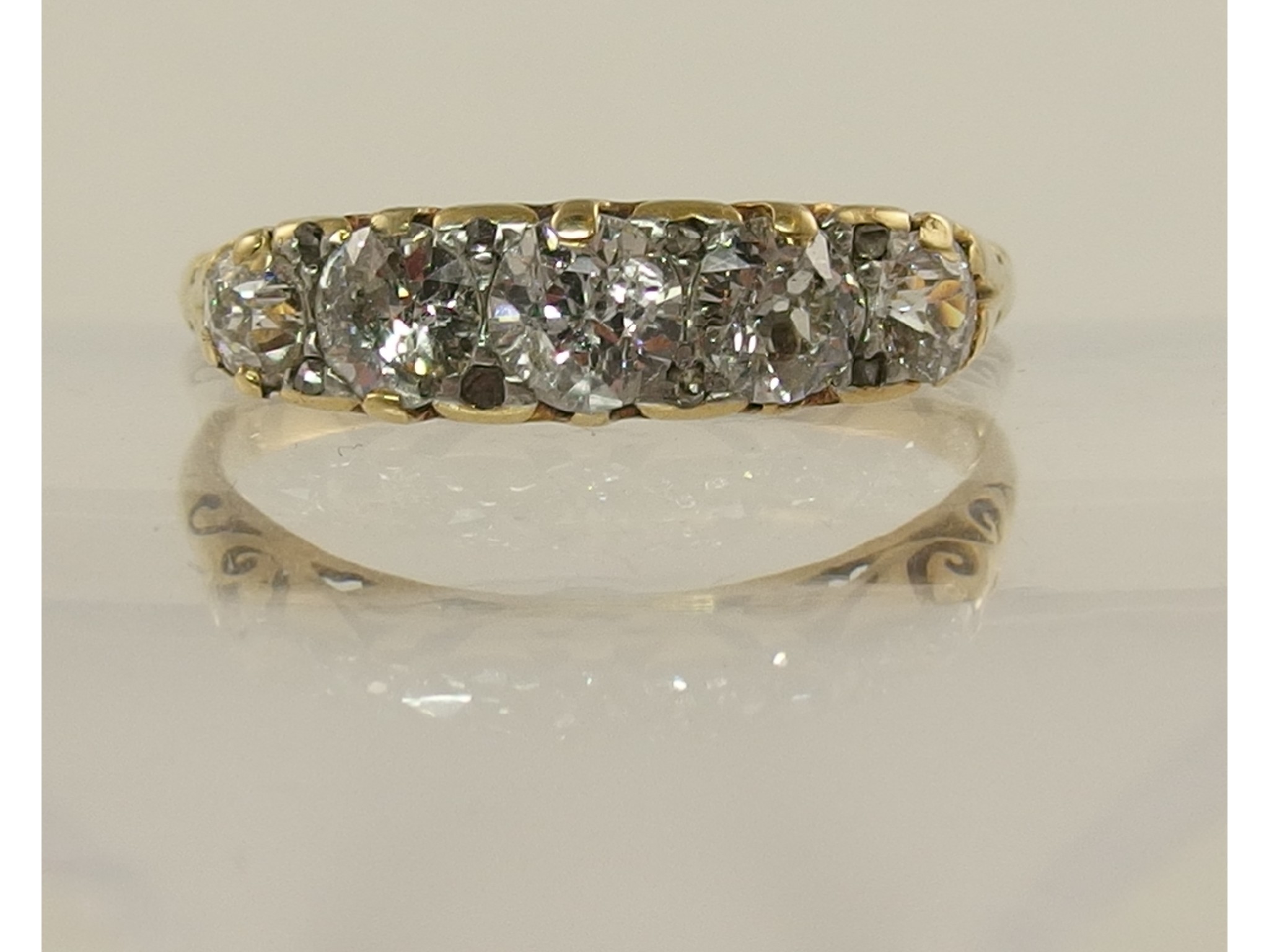 Appraisal: A yellow metal five stone diamond ring of approx cts