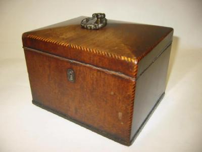 Appraisal: A GEORGE III MAHOGANY TEA CADDY of plain rectangular form