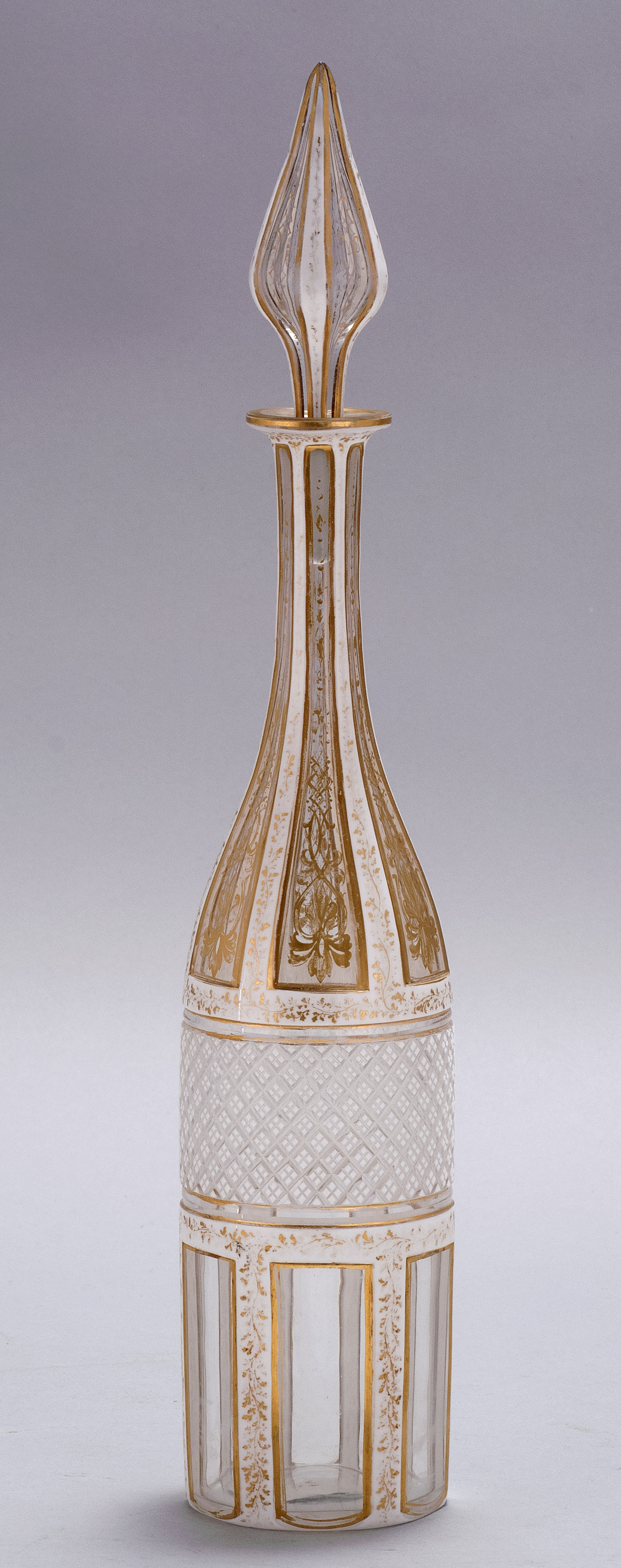 Appraisal: ENGLISH CUT OVERLAY DECANTER th CenturyIn white cut-to-clear with gilt